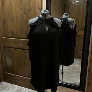 Jennifer Lopez L open shoulder key hole black cocktail dress